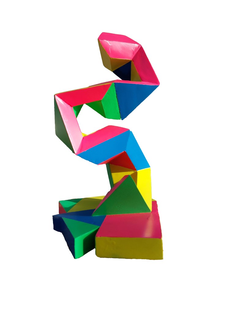 Sculptural artwork titled "Amaskopas" (2021), made from spray-painted pine wood, featuring an abstract, angular form referencing urban markings and indigenous symbolism.
